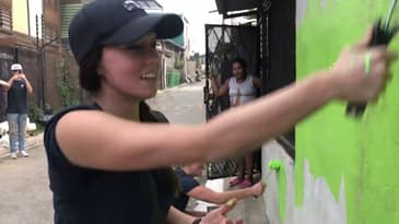 VOLUNTEERS HELPING LOCAL RESIDENTS IN THE SLUMS OF SAN JOSE