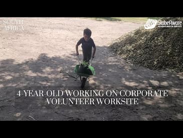 A 4-Year-Old Working On The Corporate Volunteer Worksite!