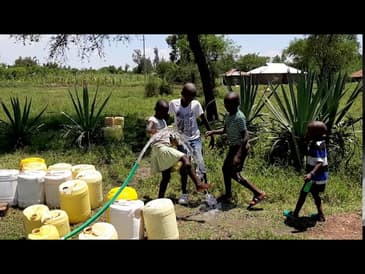 Kenya! Children Enjoying Water From The New Water Well