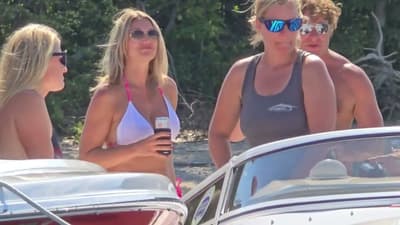 Power boat tie-off  hot day on the pontoon boat at the sandbar. 