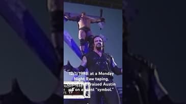 12/1/1998: at a Monday Night Raw taping, Undertaker raised Austin up on a giant “symbol.”