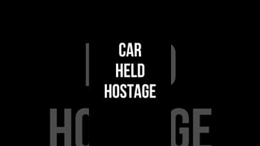 CAR HELD HOSTAGE