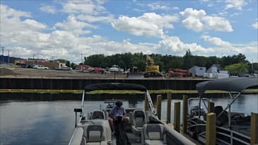 Blue Sky Boat covers, how easy to pull off. Putting up a new flag, and the old one's. 