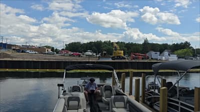 Blue Sky Boat covers, how easy to pull off. Putting up a new flag, and the old one's. 