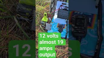 GMRS 50Pro from Btech, a Ryobi Battery and an Aldi Shopping Bag....