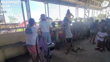 The Whole Community Is Here To Hand Out Jollibee Meals! A Globe Aware Summer in the Philippines