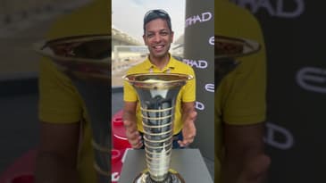 Hands on the F1 Drivers’ Championship trophy…almost!