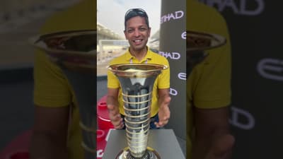 Hands on the F1 Drivers’ Championship trophy…almost!