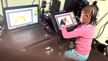 My daughter playing around with the Huion Kamvas Pro 16 2 5K graphics tablet.