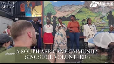 (Clip 1) Hout Bay IY Community Sings For Globe Aware Corp Volunteers In South Africa