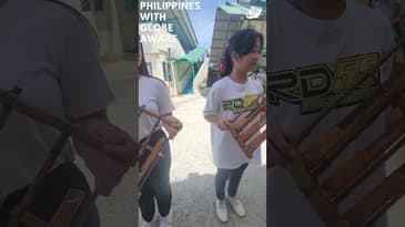 Students Practicing A Musical Welcome! A Globe Aware Summer in the Philippines