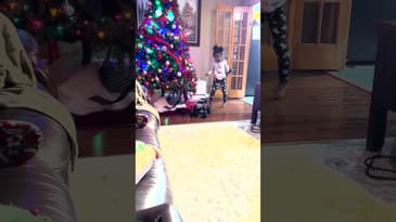 My kids learning to drive the DEERC DE60 Large 1:8 Scale Upgraded Remote Control Truck indoors