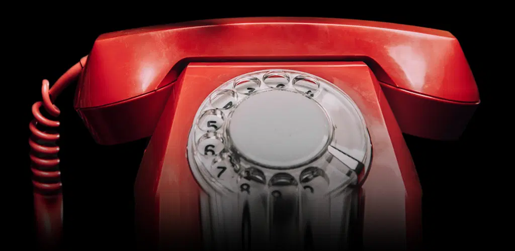 Red phone the logo to Tell ME A Ghost Story