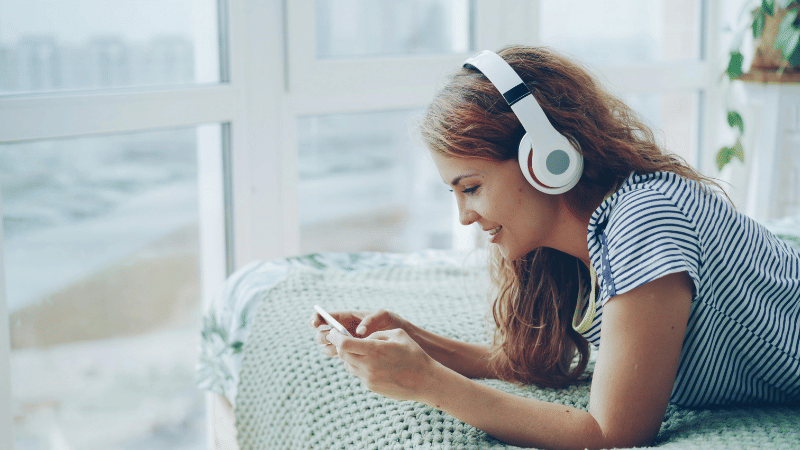 woman listening on headphones