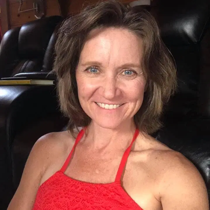 Lori Ann King, smiling