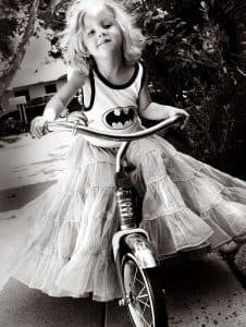Bat girl on a bike