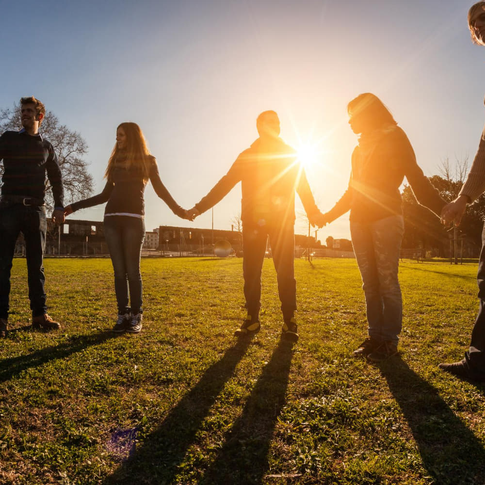 Community members connecting and sharing support in a welcoming space