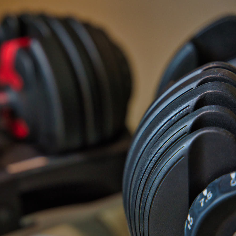 Adjustable dumbbells for versatile home strength workouts