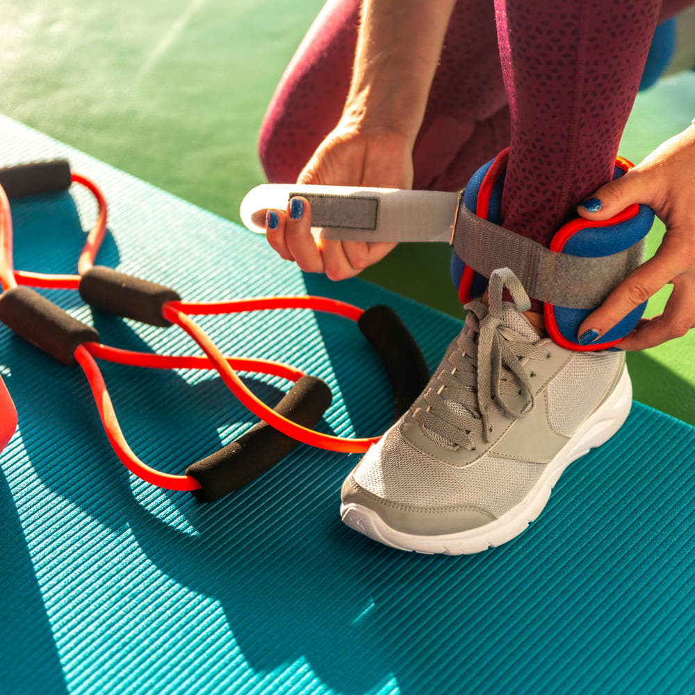 Adjustable ankle weights for selected exercise routines