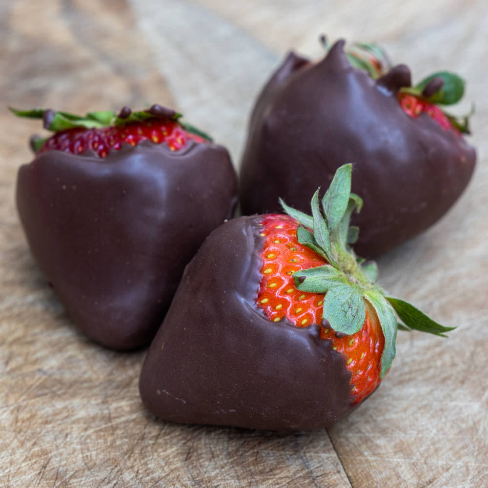 Strawberries covered in dark chocolate for a Halloween treat