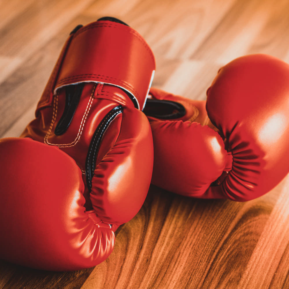 Boxing gloves for bag work or supervised fitness training