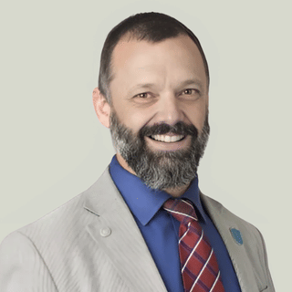 Dr. Timothy Stark, MPhil, MBA, DC, DACBSP, ICSC, CSCS, EMT, FICC