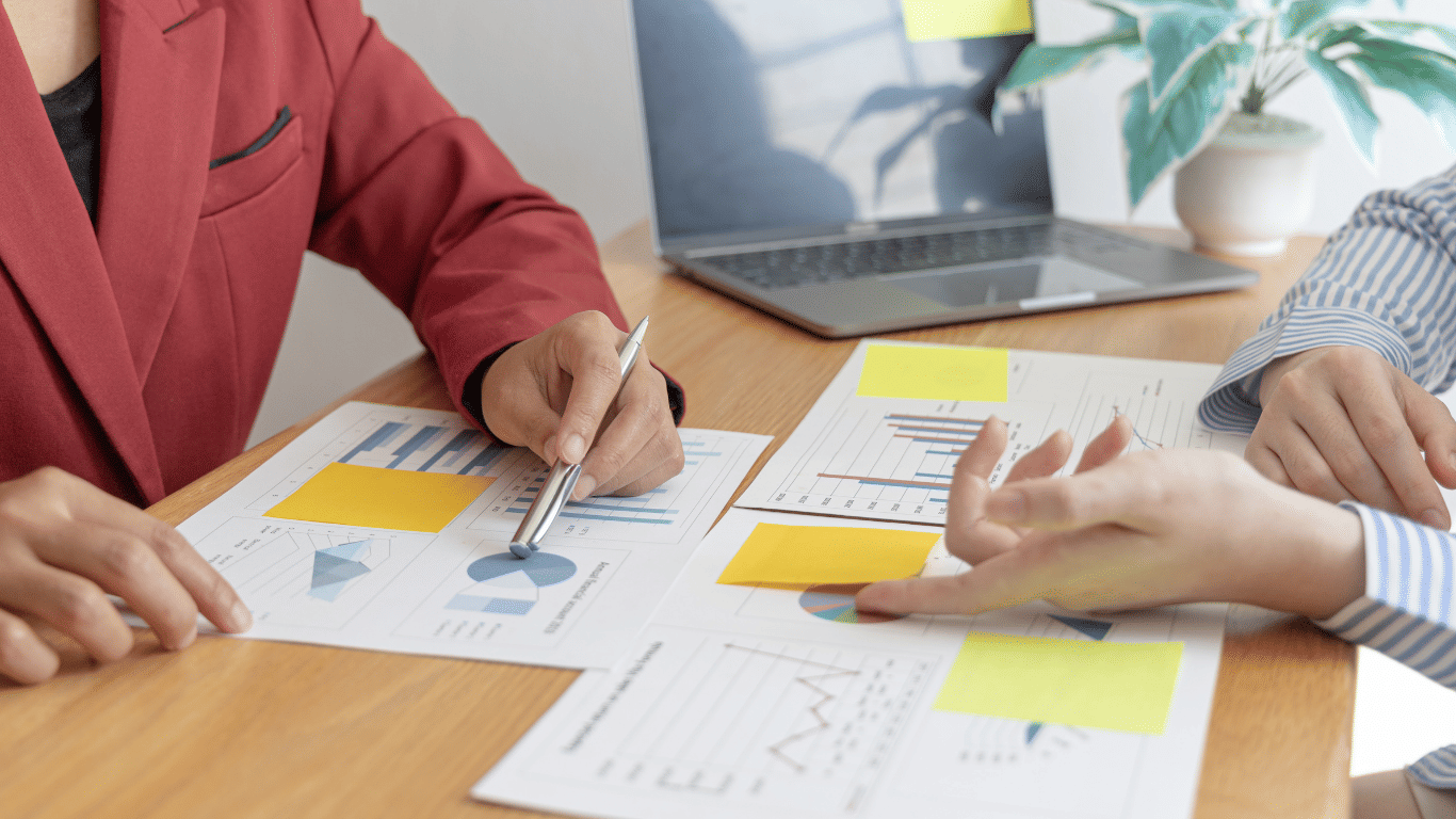 How to Become a CFO Image of finance executive sharing financial statements