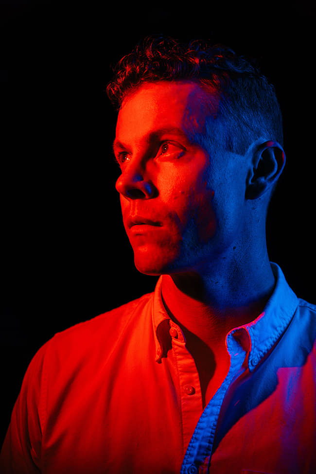 Photograph of Ross Bryant looking off to the side by Jill Petracek